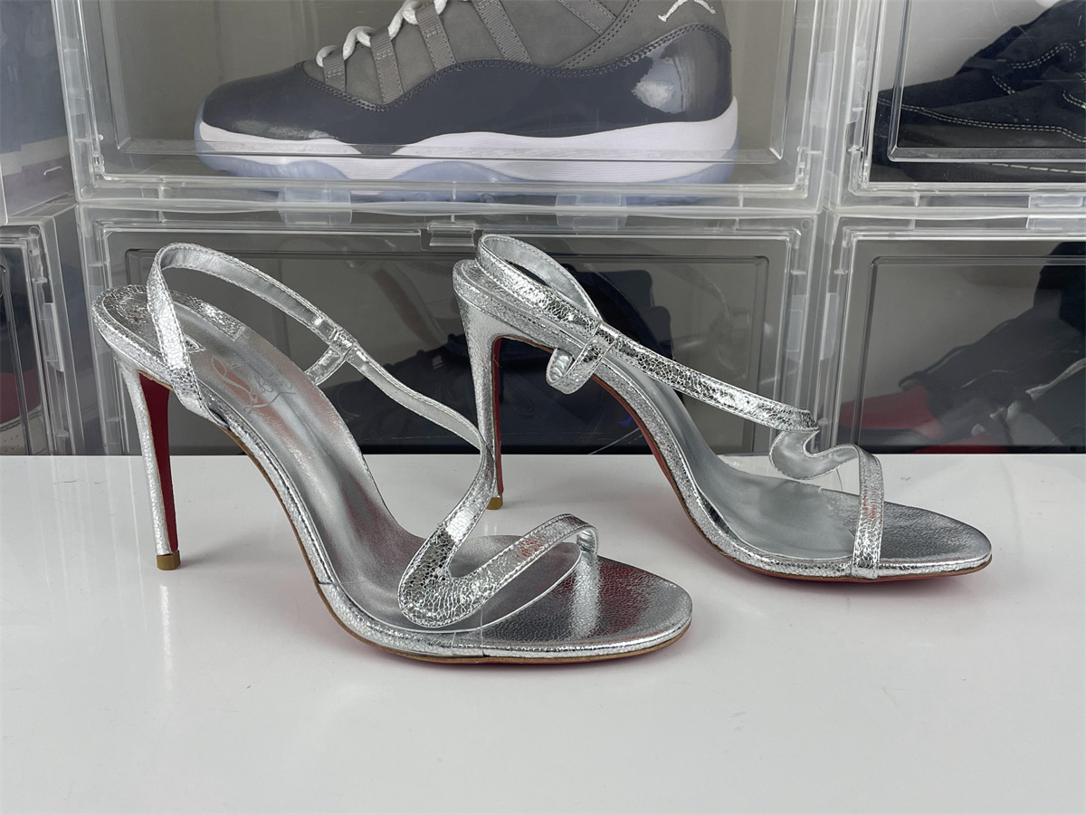 christian louboutin CL Silver high heel with red bottom