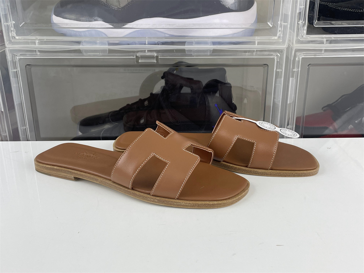 H brand Brown smooth leather slippers