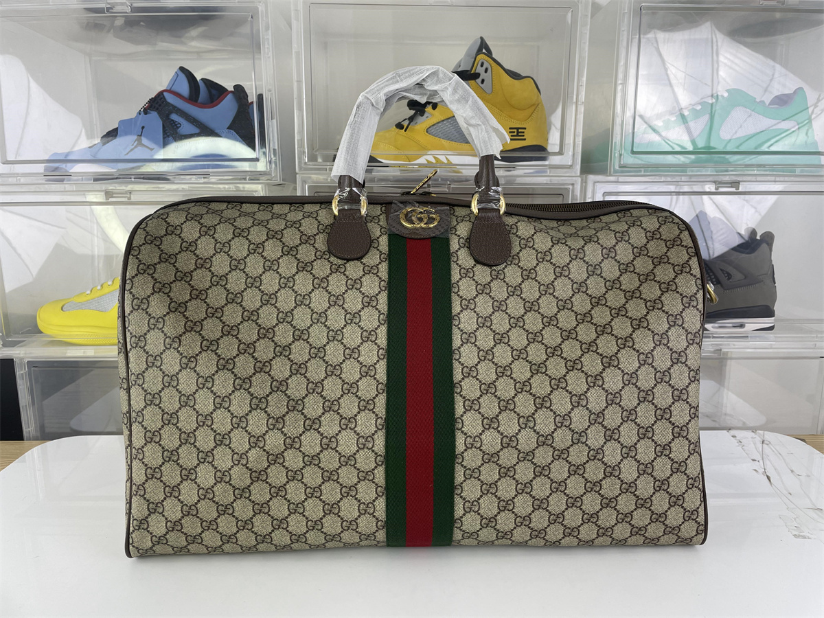 GUCCI Brown travalling handle bag, (52 x 33 x 28 cm)